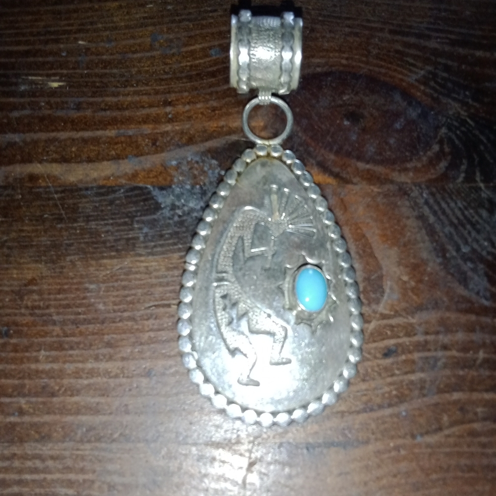 Sterling Silver and Brilliant Turquoise Navajo pendant